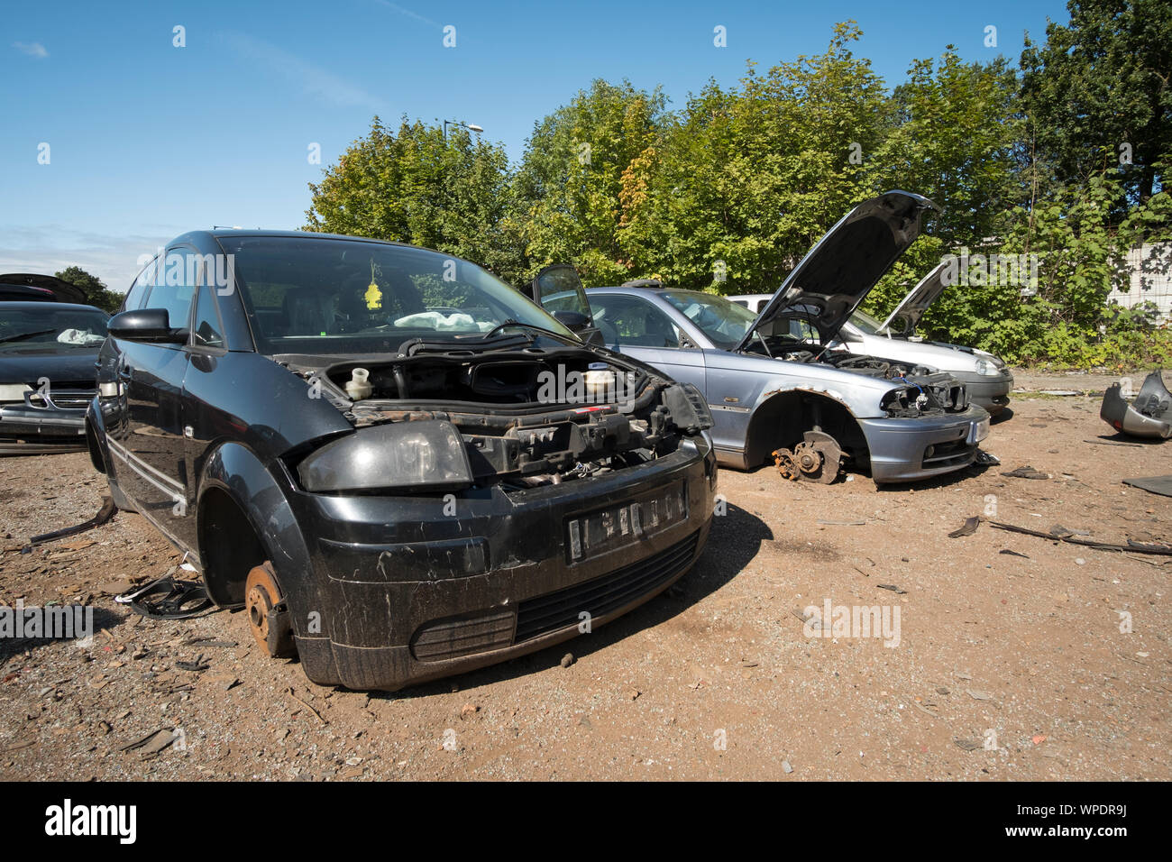 Scrapped cars in a motor salvage yard Stock Photo