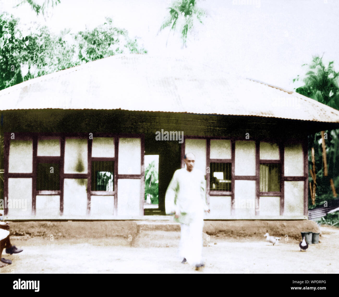 Prof Nirmal Kumar Bose leaving hut, Srirampur, East Bengal, Bangladesh, Asia, 1946 Stock Photo