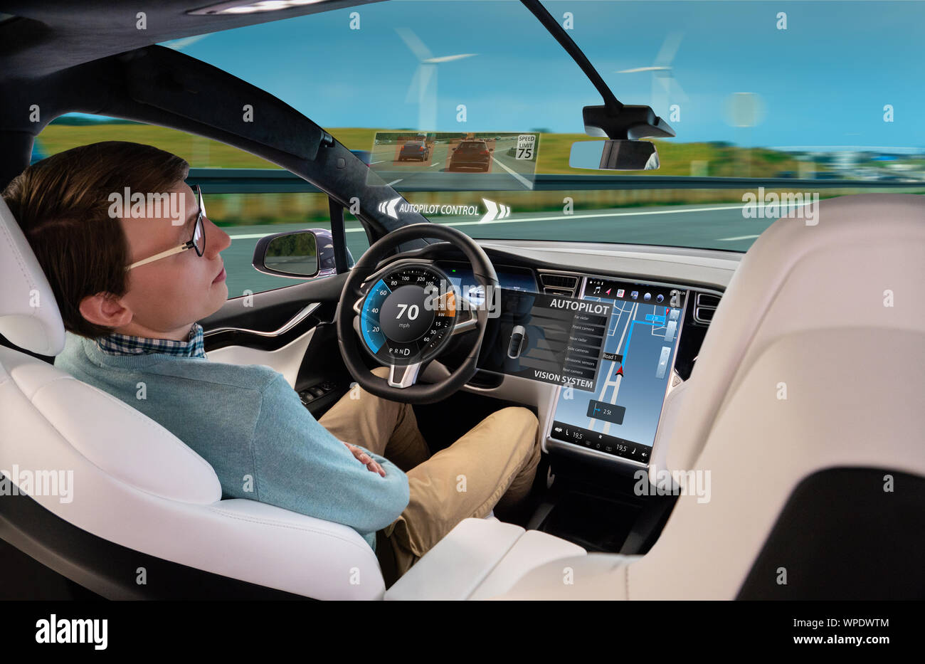 Man resting while his car is driven by an autopilot. Self driving vehicle concept Stock Photo