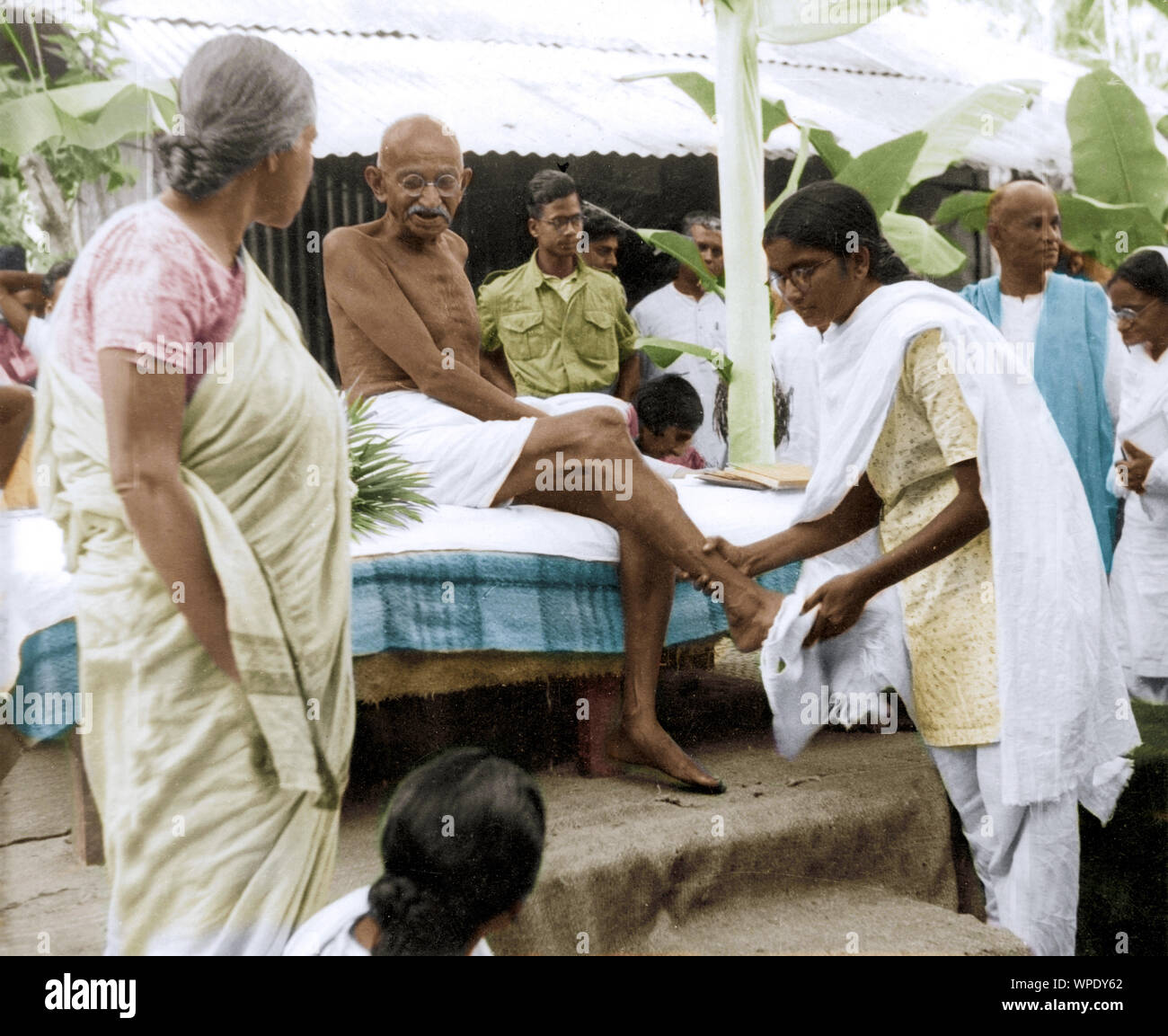 Washing Mahatma Gandhi feet after walking, East Bengal, India, Asia, January 1947 Stock Photo