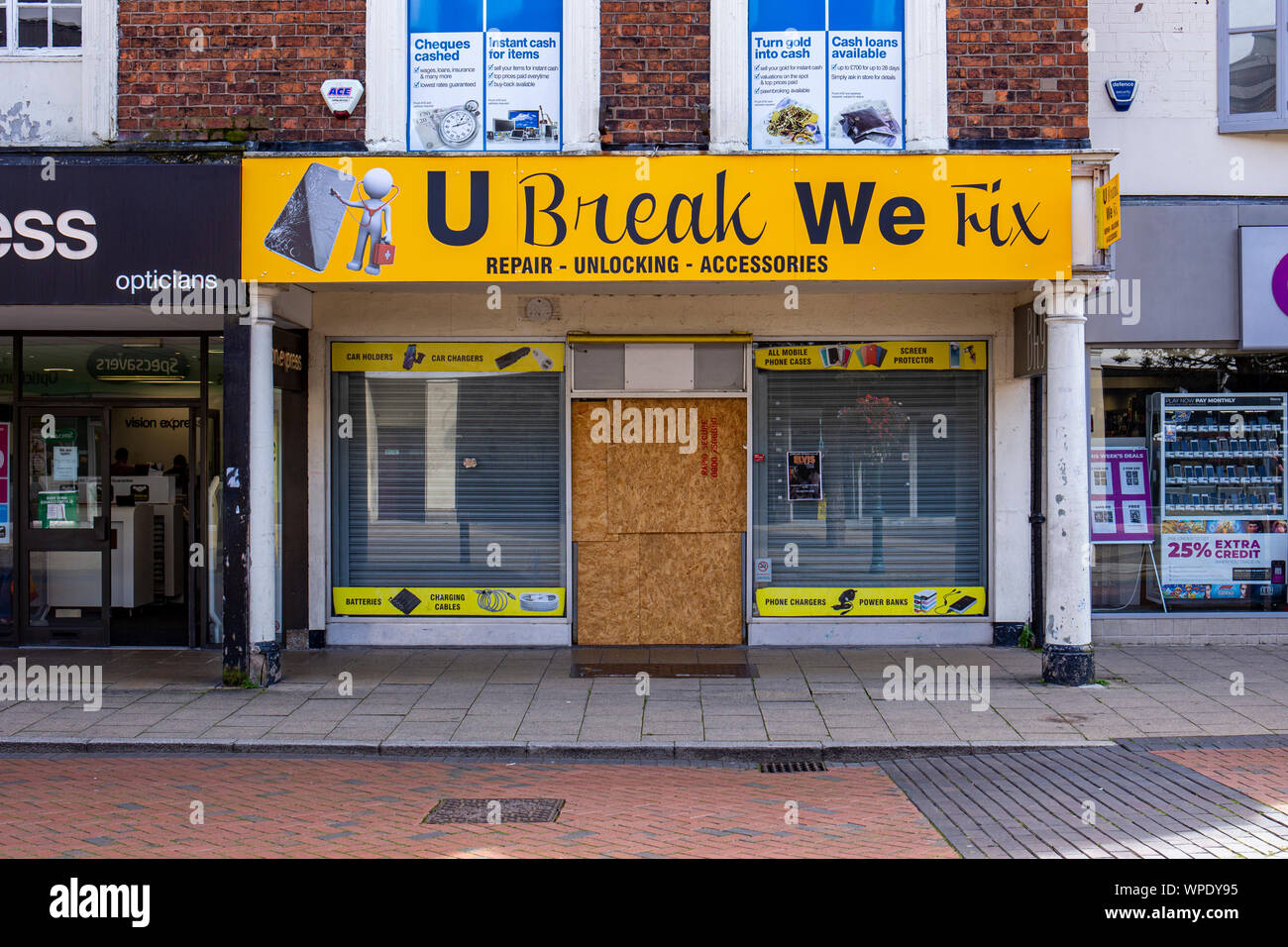 U Break We Fix Advert On Front Of Mobile Phone Repair Shop In