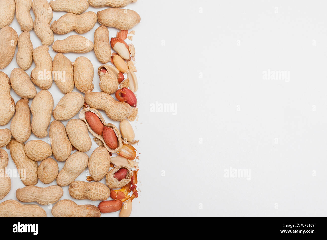 Large peeled peanuts closeup of beans in the shell. Unpeeled peanuts