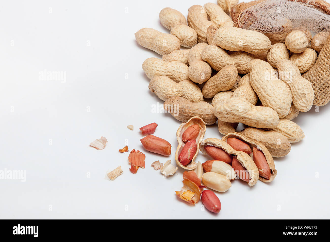 Large peeled peanuts closeup of beans in the shell. Unpeeled peanuts