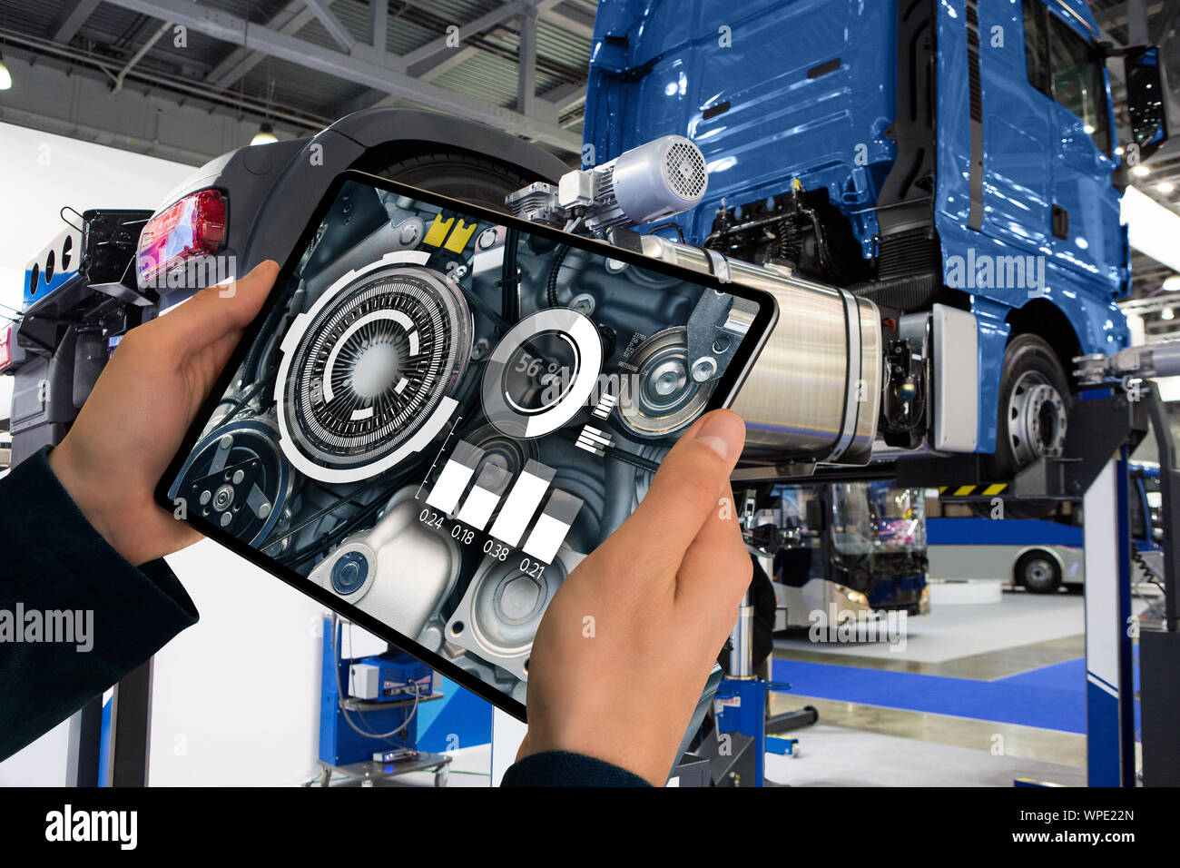 Repairing a truck with augmented reality Stock Photo