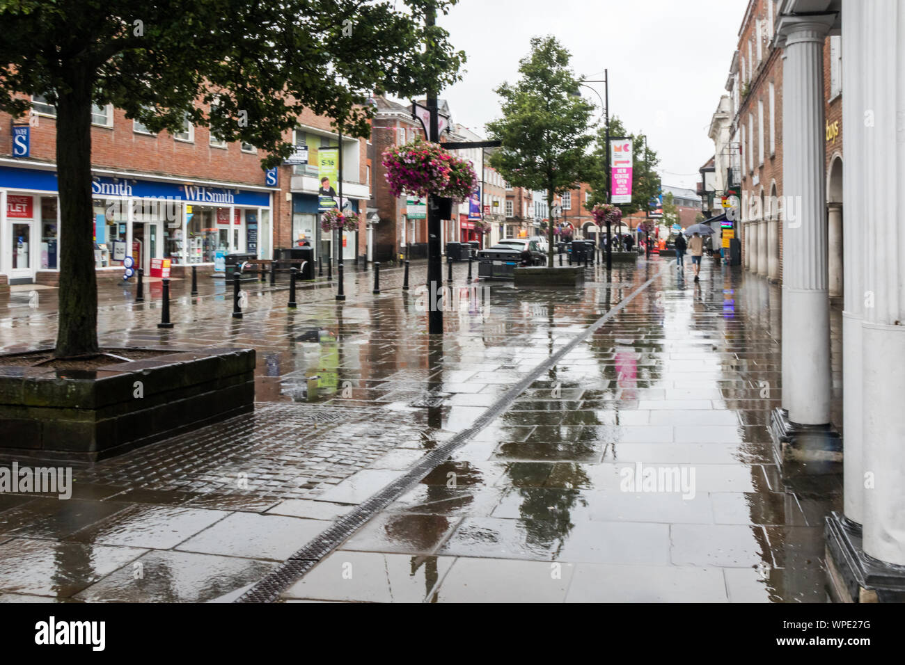 High Wycombe, Engalnd - August 14th 2019: The high street looking towards the Guidhall on a rainy day. Summer rain is not unusual in the UK. Stock Photo
