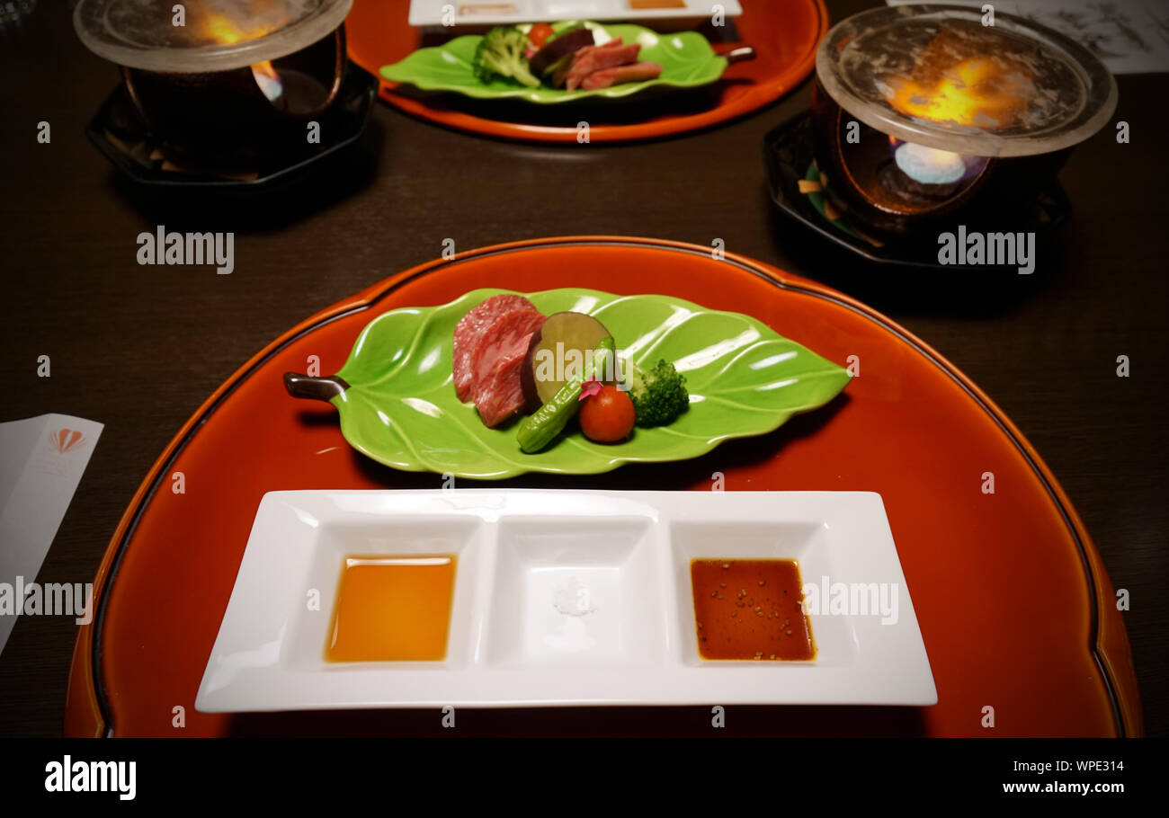 Beef and vegetables barbecue with salt and sauces, Japanese kaiseki