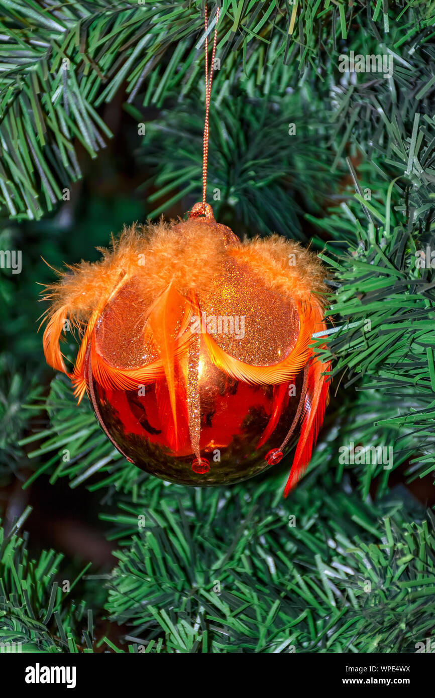 Christmas toys on the Christmas tree. Festive mood Stock Photo - Alamy