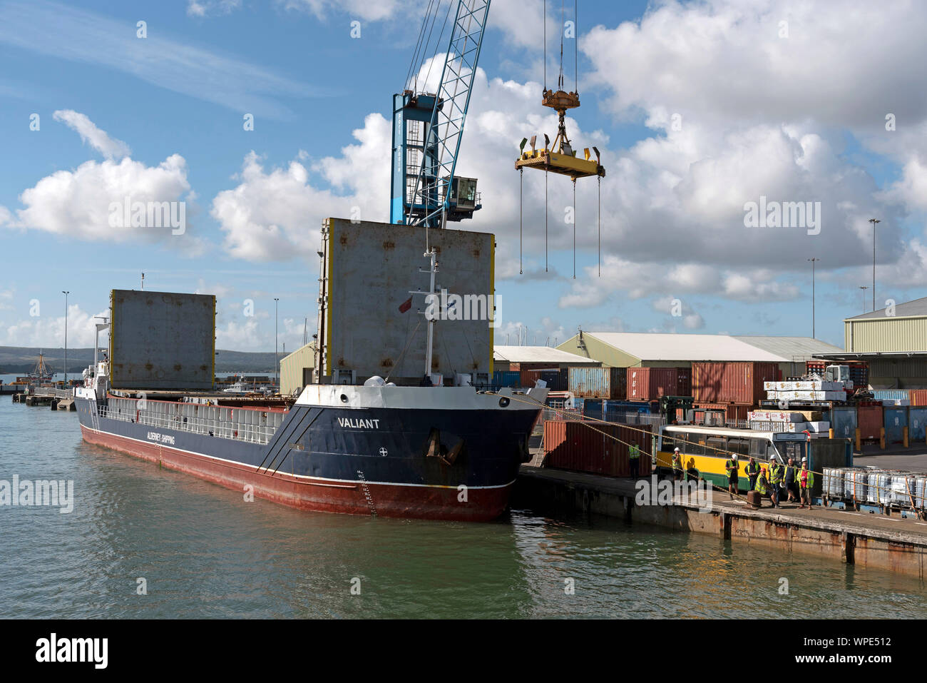 Poole Harbour, Dorset, England, UK. September 2019. The Valiant a general cargo vessel unloading from her berth in Poole Harbour. Stock Photo