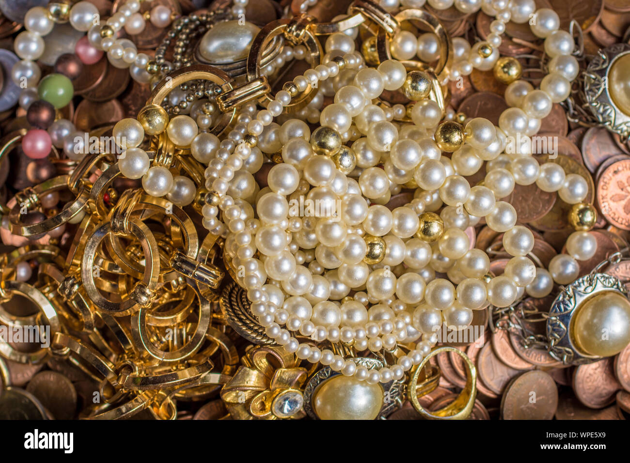 Gold, coins and jewelry as treasure in detail Stock Photo - Alamy