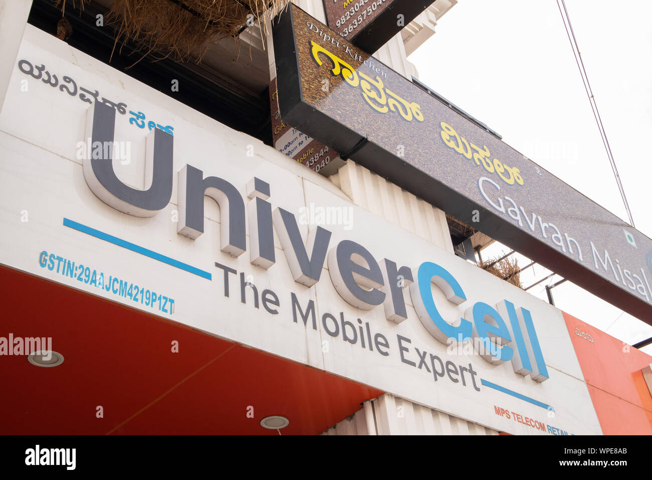 Bengaluru, India June 27,2019 : Front view Bill board of Univercell Mobiles at Bengaluru. Stock Photo