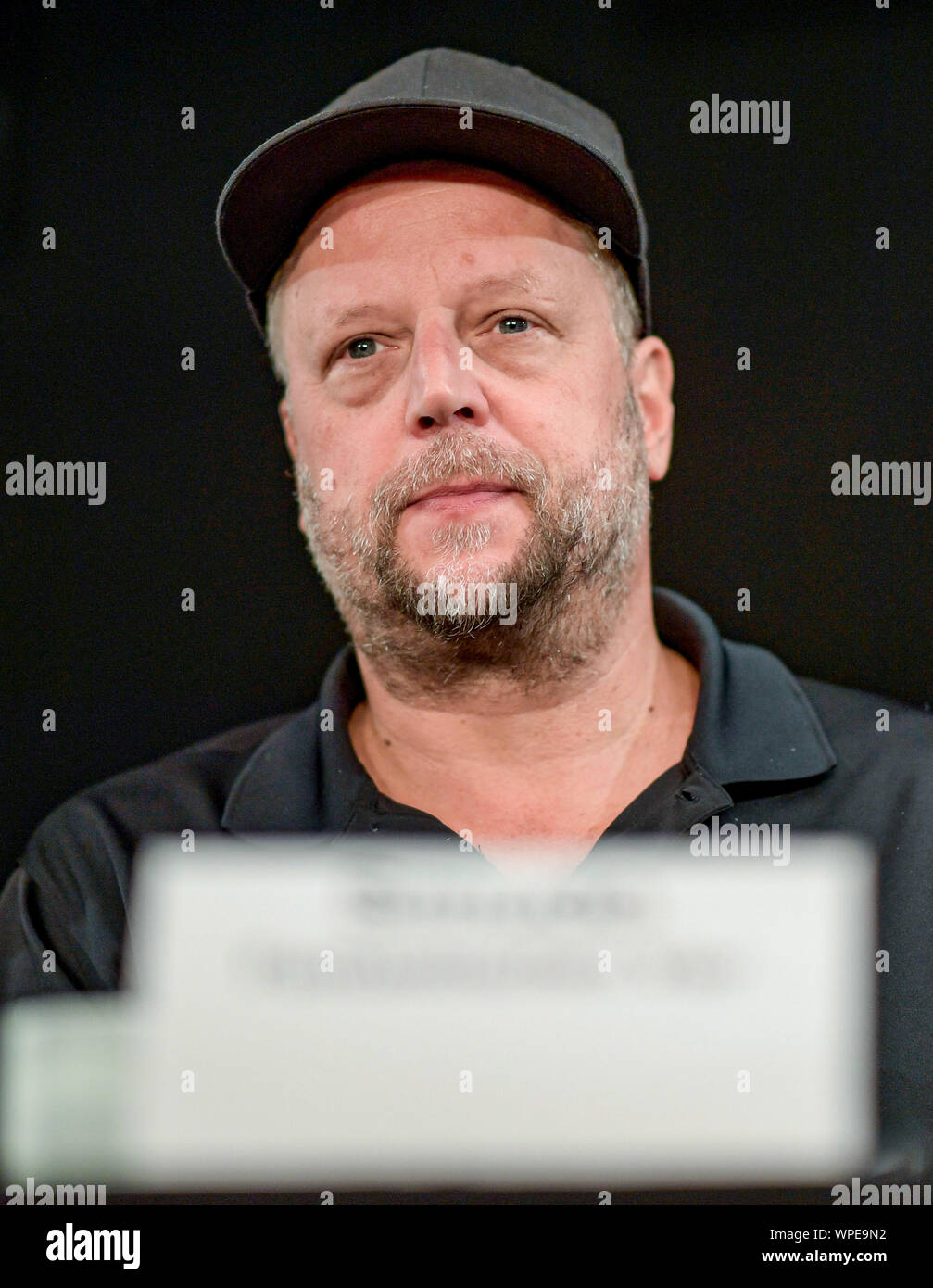Hamburg, Germany. 09th Sep, 2019. Smudo, musician, follows the press conference from Alliance #Undivisible. Among other things, the alliance expressed its views on the elections in Saxony and Brandenburg as well as the upcoming state elections in Thuringia. Credit: Axel Heimken/dpa/Alamy Live News Stock Photo