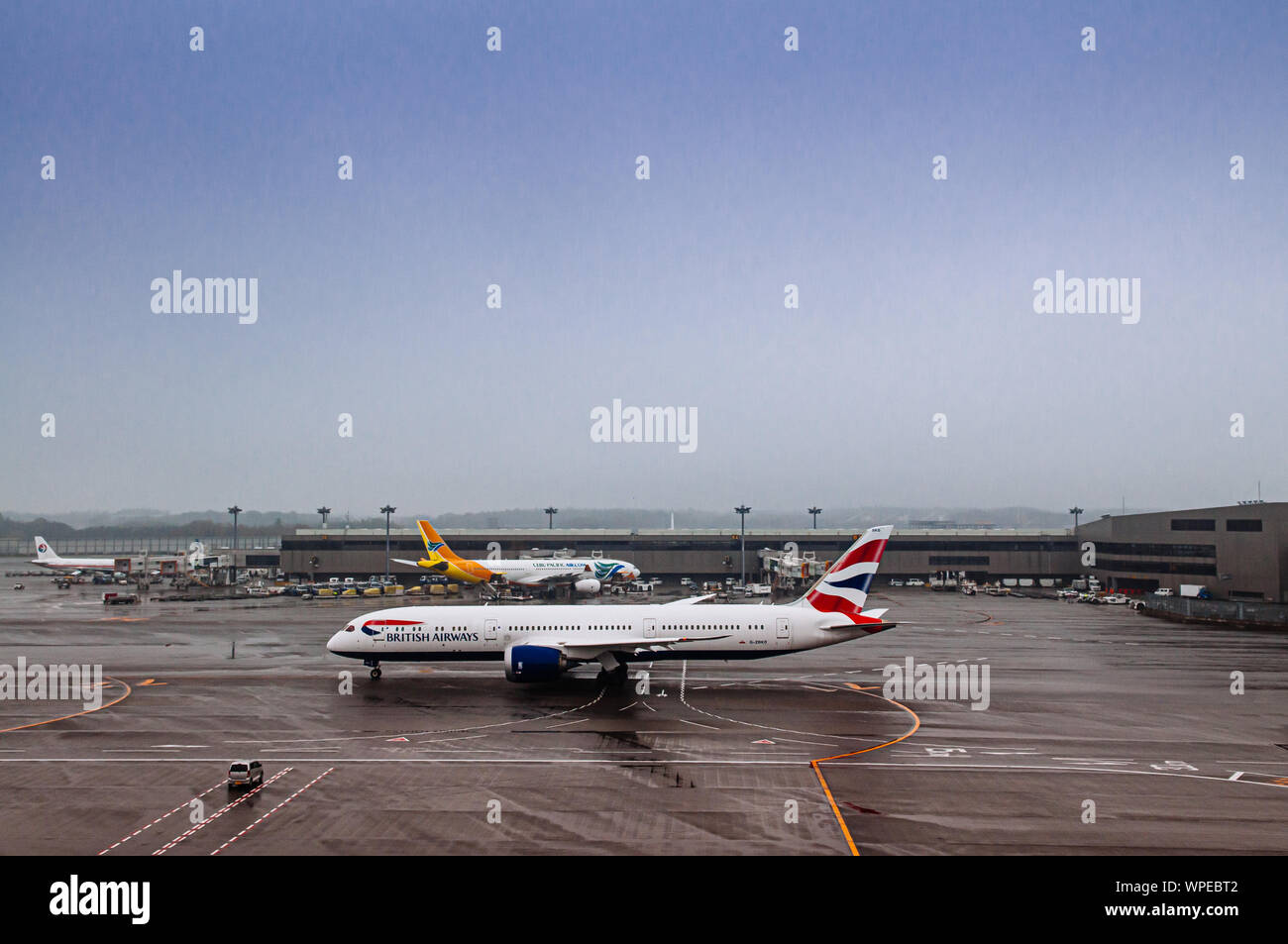 DEC 6, 2018 Narita, Japan Airplane during raining bad weather at