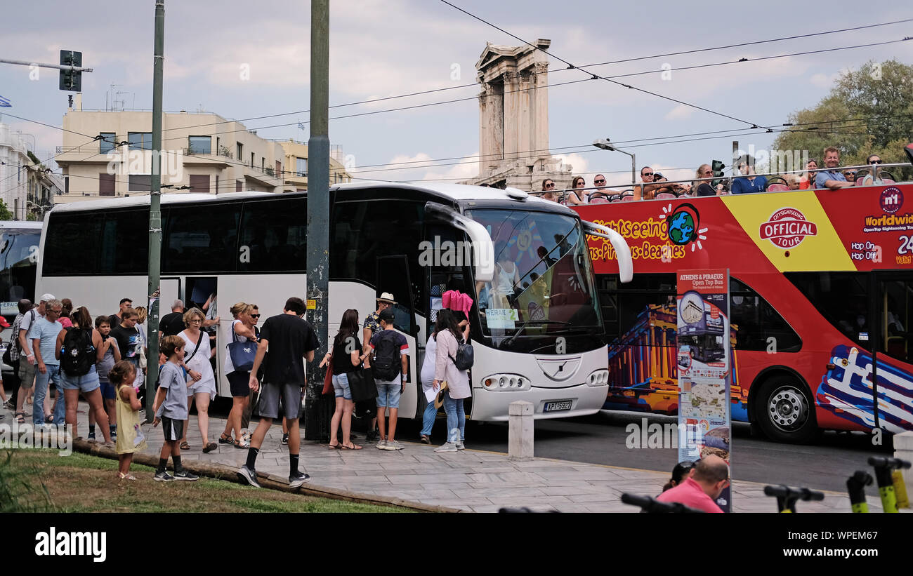 Tourists boarding coaches and buses in Athens, Greece, Stock Photo