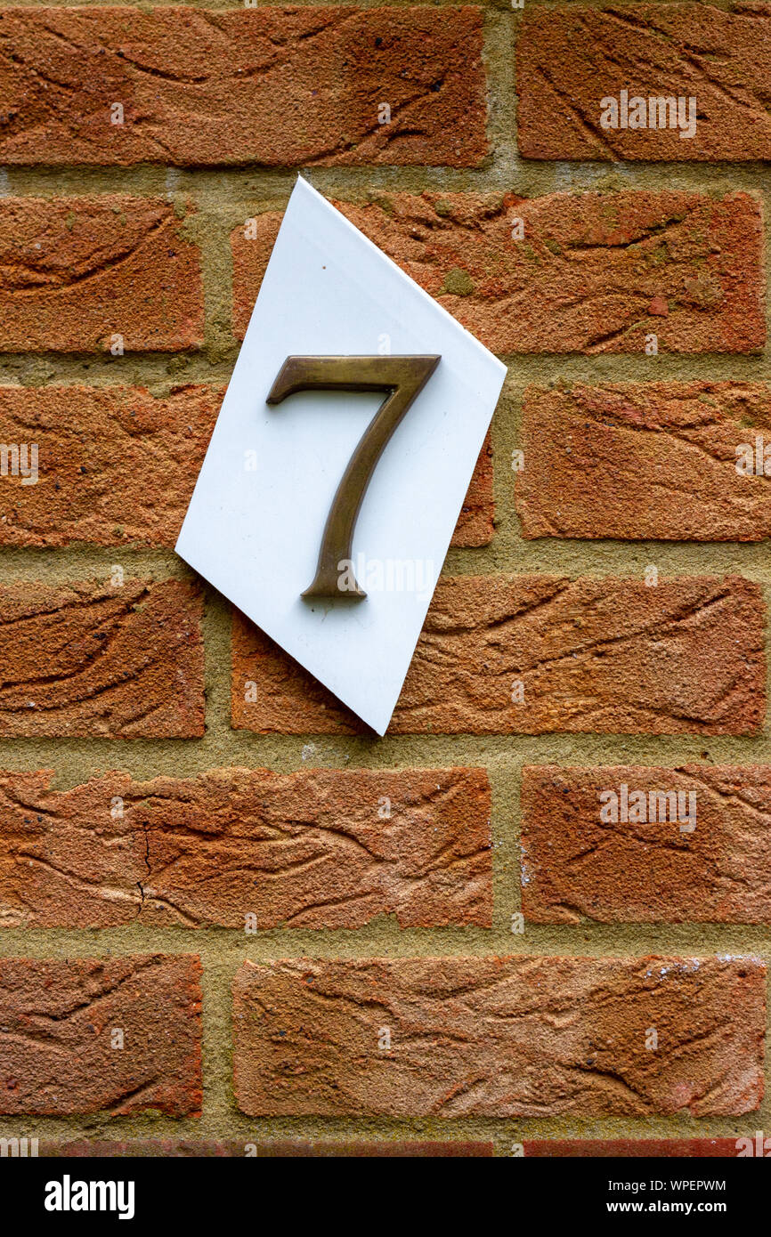House number 7 on a red brick wall Stock Photo Alamy