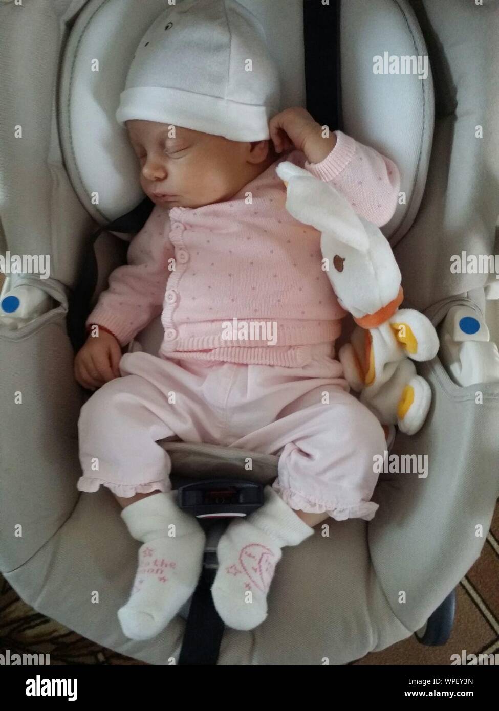 Baby sleeping on stroller in hires stock photography and images Alamy