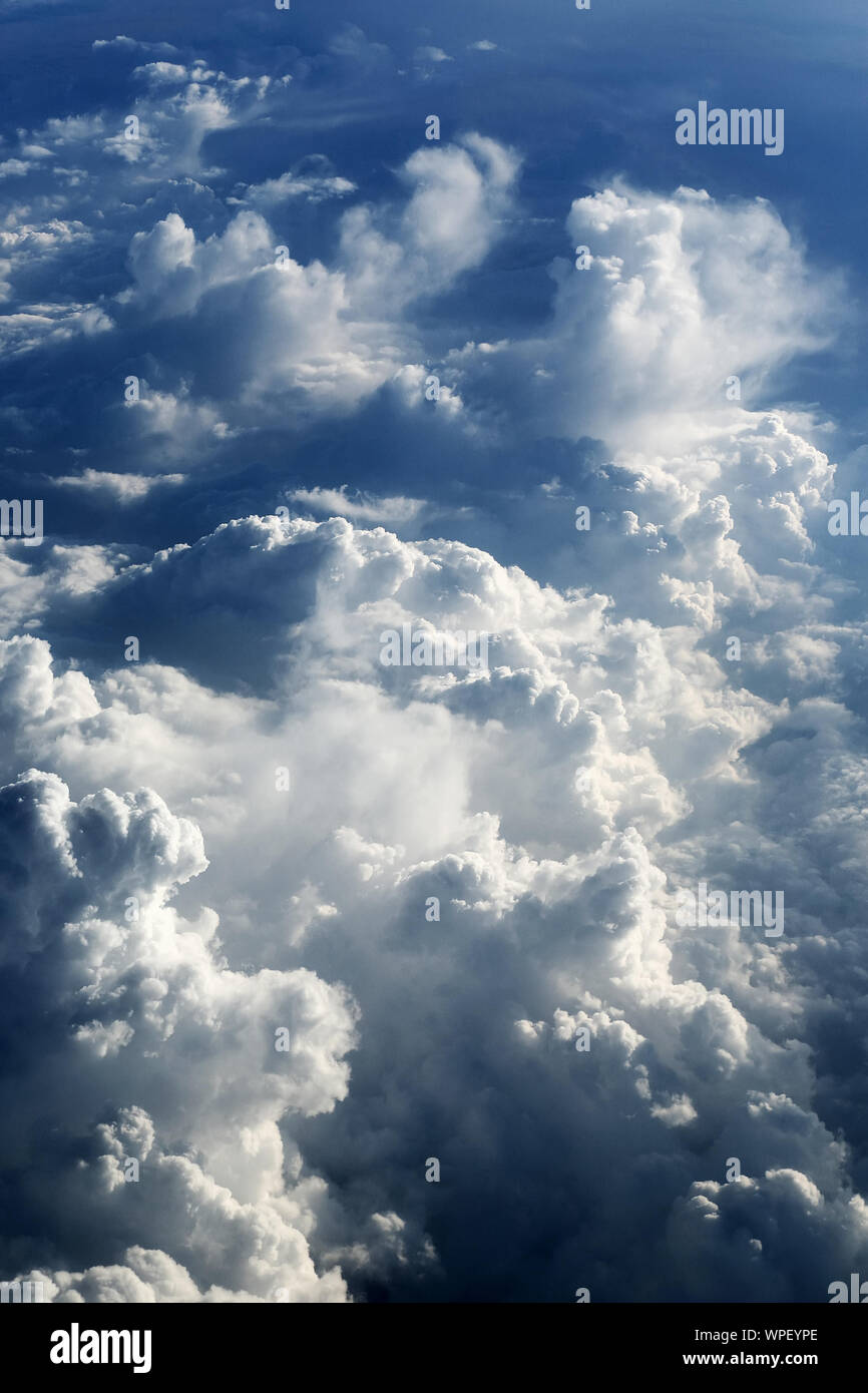 View Of Fluffy Clouds In Sky Stock Photo