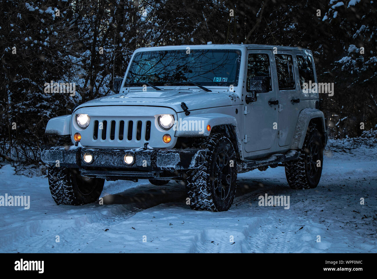 Jeep Wrangler Off-Road in Snow Stock Photo