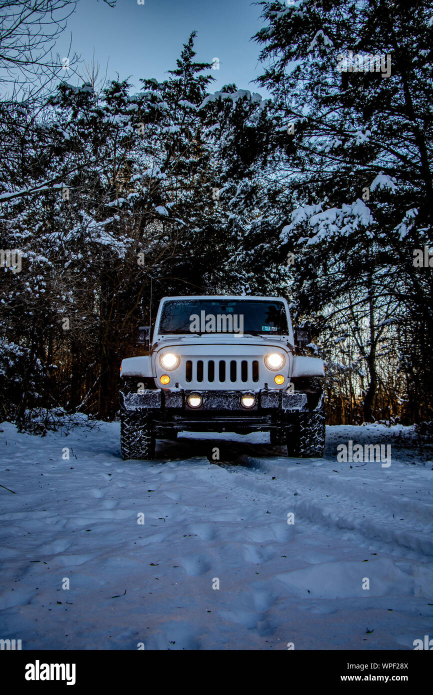 Jeep Wrangler Off-Road in Snow Stock Photo