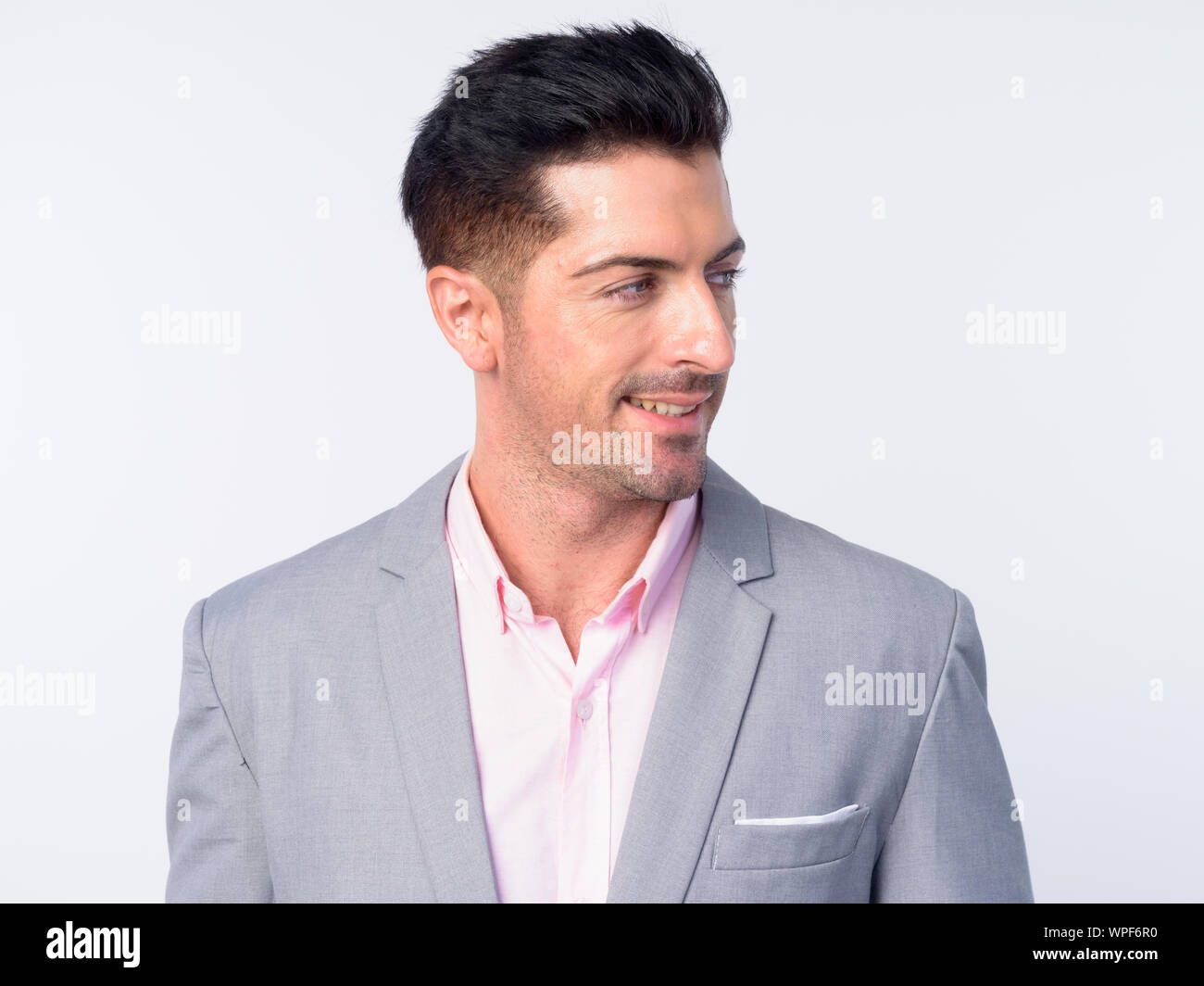 Face of young handsome businessman in gray suit Stock Photo - Alamy