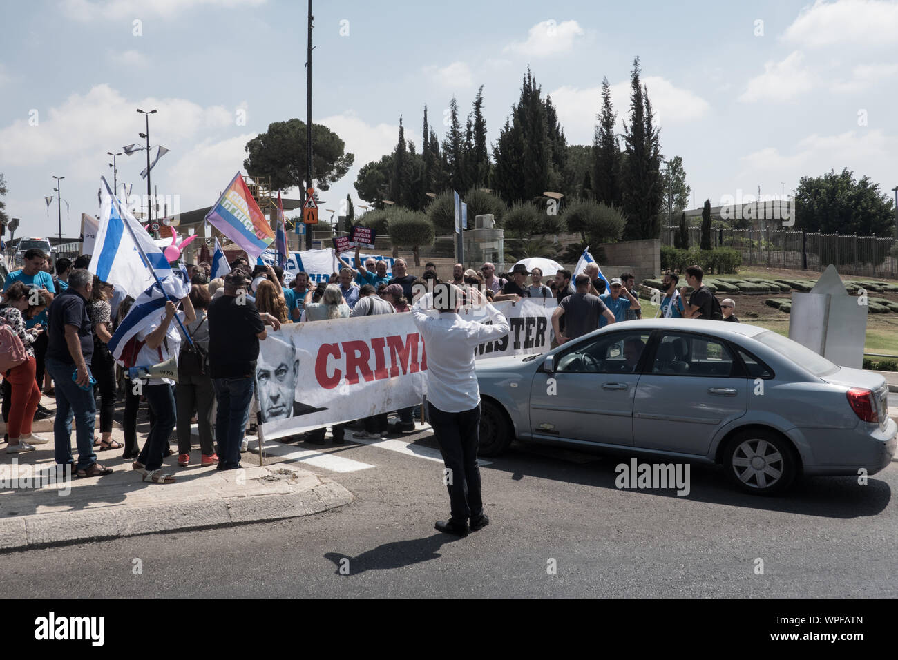 Jerusalem, Israel. 9th September, 2019. Democratic Union activists block the access road to the Israeli Parliament protesting against PM Netanyahu citing criminal suspicions, immoral campaigning and a blitz attempt to legislate the allowance of cameras inside election ballot booths. An assortment of political parties demonstrated in front of the Israeli Parliament building with similar messages ahead of round two of the national elections for parliament scheduled for 17th September, 2019. Credit: Nir Alon/Alamy Live News. Credit: Nir Alon/Alamy Live News Stock Photo