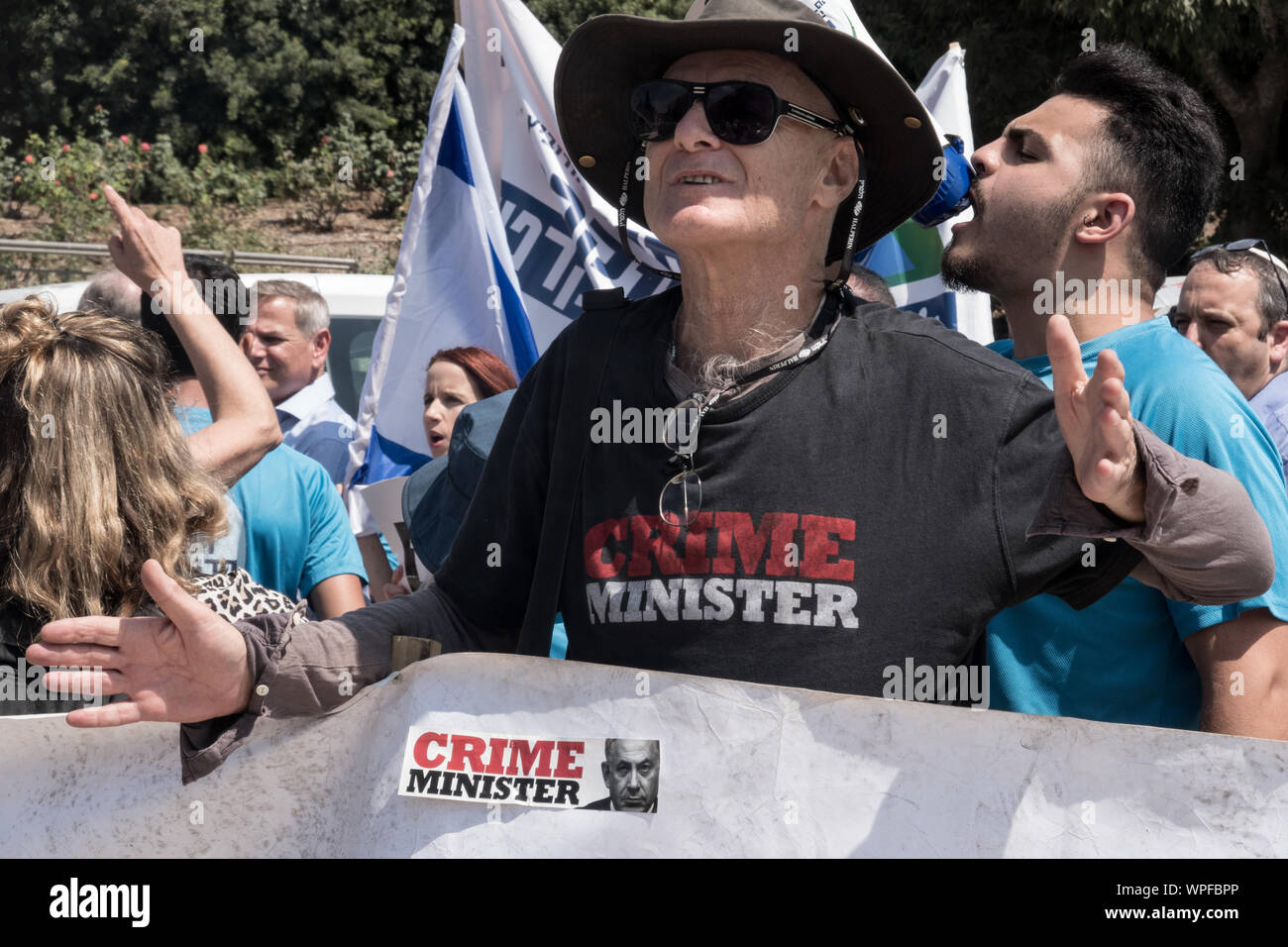 Jerusalem, Israel. 9th September, 2019. Democratic Union activists block the access road to the Israeli Parliament protesting against PM Netanyahu citing criminal suspicions, immoral campaigning and a blitz attempt to legislate the allowance of cameras inside election ballot booths. An assortment of political parties demonstrated in front of the Israeli Parliament building with similar messages ahead of round two of the national elections for parliament scheduled for 17th September, 2019. Credit: Nir Alon/Alamy Live News. Credit: Nir Alon/Alamy Live News Stock Photo