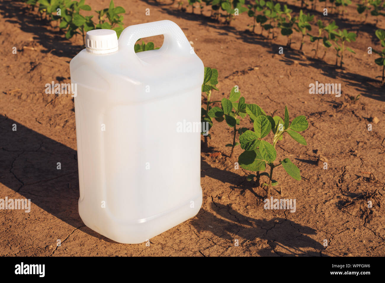 Soybean crop protection concept with blank generic pesticide canister