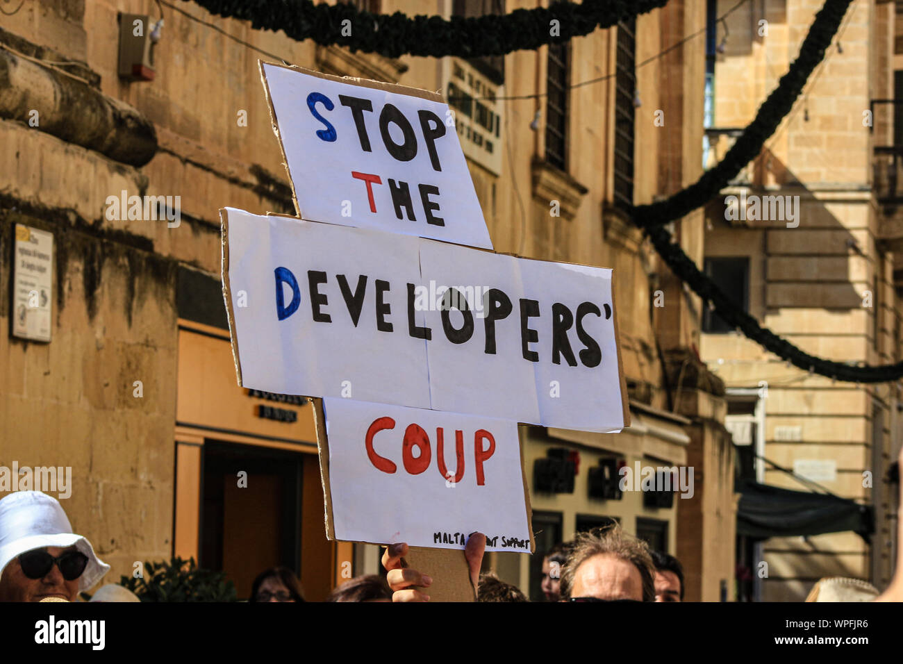 Enough is enough. A demonstration against environmental destruction in Malta. Protesting at out of control construction, road building. Stock Photo