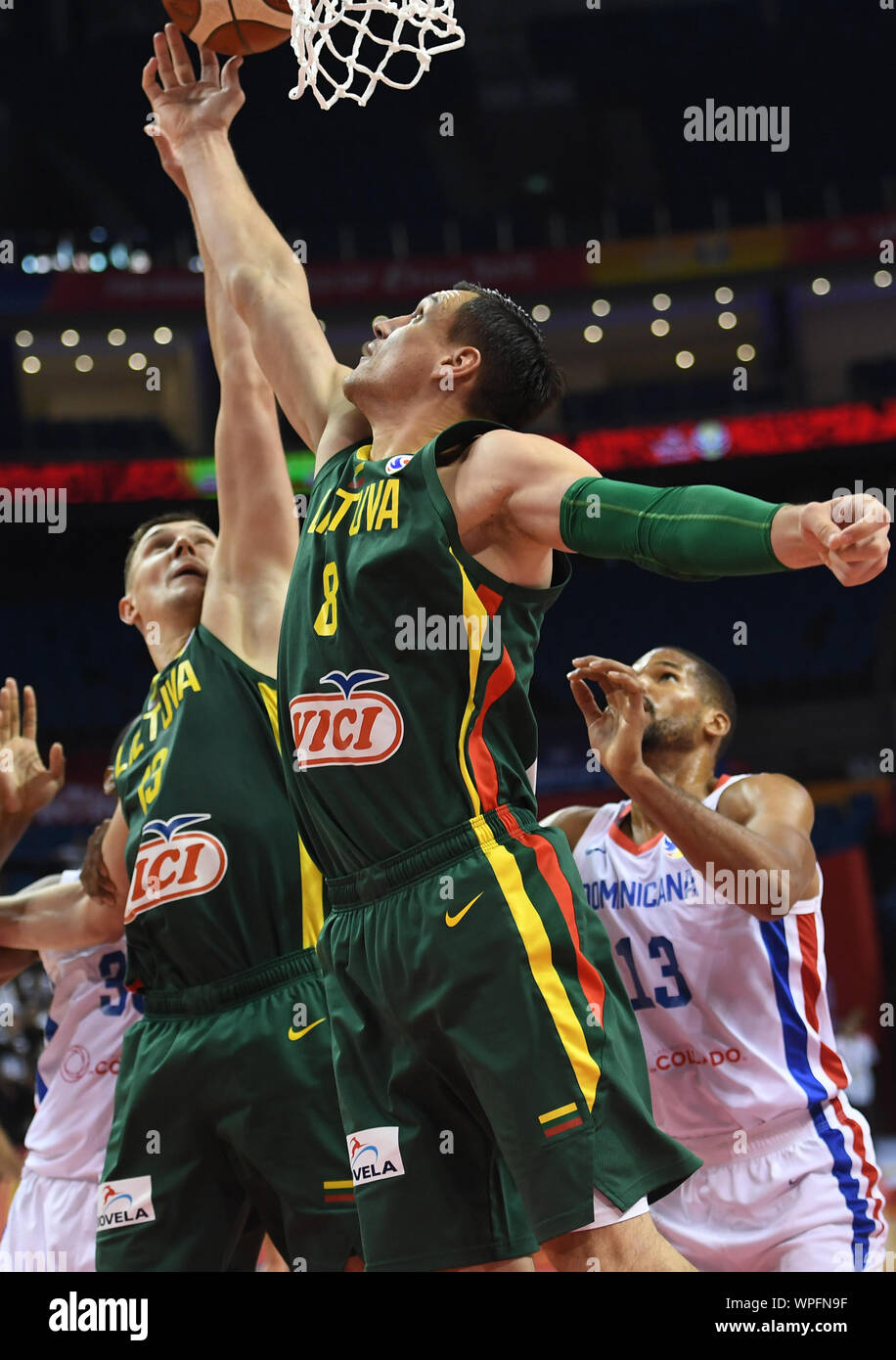 Nanjing, China's Jiangsu Province. 9th Sep, 2019. Jonas Maciulis (C) of Lithuania competes for the ball during the group L match between the Dominican Republic and Lithuania at the 2019 FIBA World Cup in Nanjing, east China's Jiangsu Province, Sept. 9, 2019. Credit: Han Yuqing/Xinhua/Alamy Live News Stock Photo