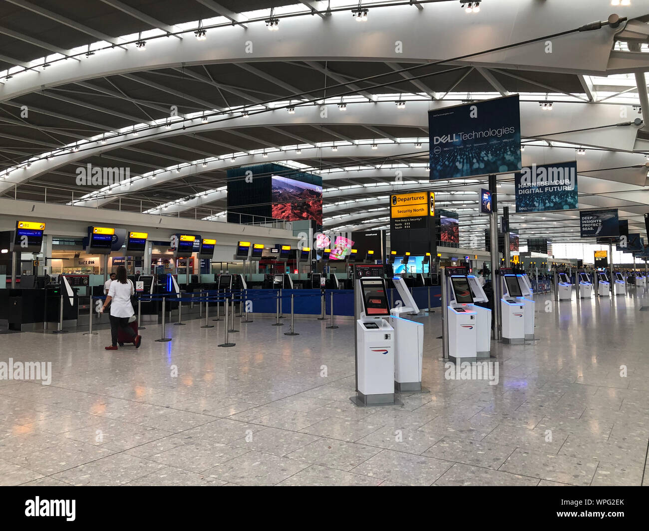Inside Terminal Five at Heathrow Airport, London, on day one of the first-ever strike by British Airways pilots. The 48 hour walk out, in a long-running dispute over pay, will cripple flights from Monday, causing travel disruption for tens of thousands of passengers. Stock Photo