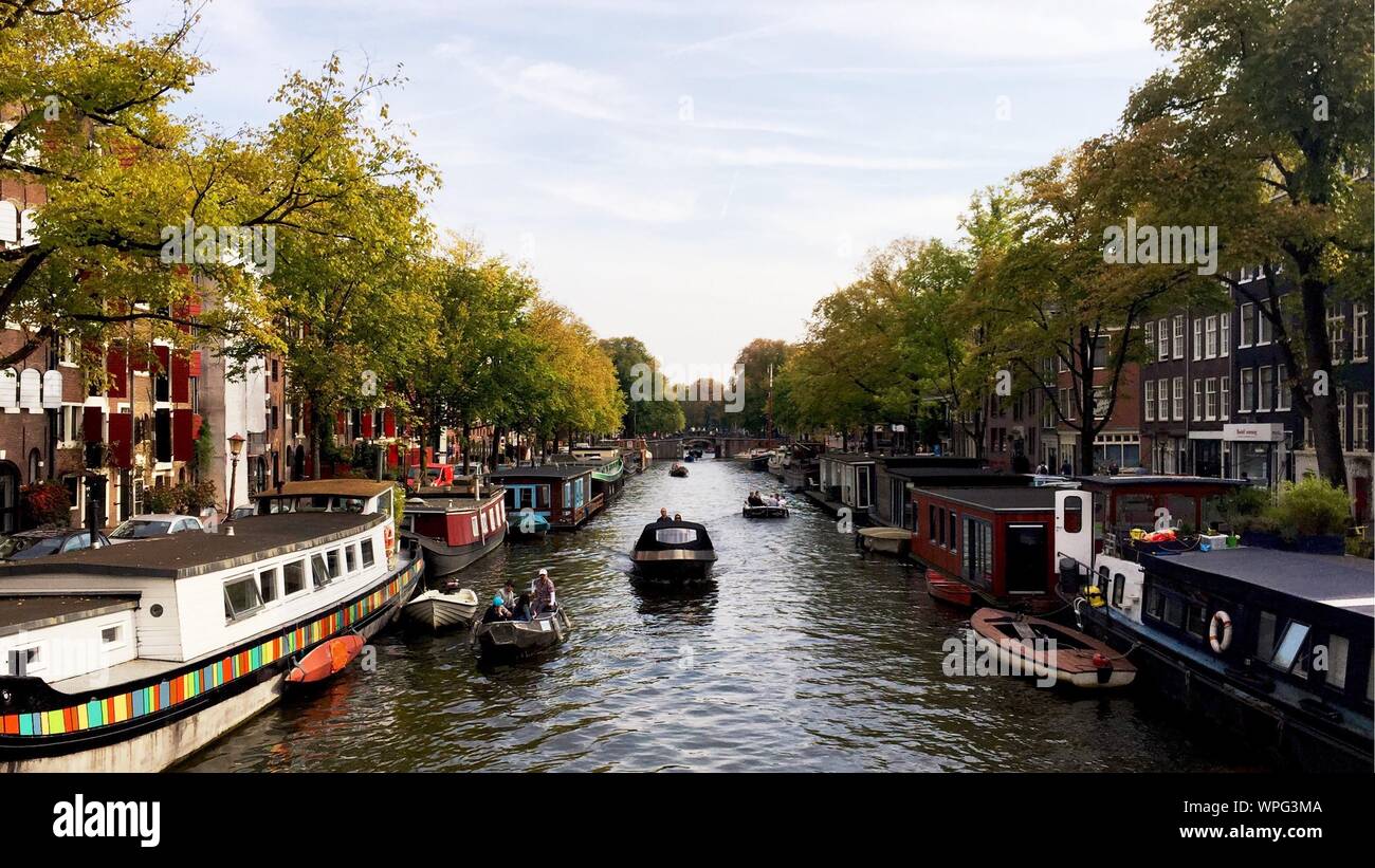 View Of Canal Along Buildings Stock Photo