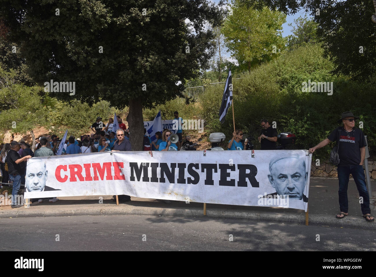 Jerusalem, Israel. 09th Sep, 2019. Supporters of the Democratic Union Party hold a banner with photos of Israeli Prime Minister Benjamin Netanyahu, reading 'CRIME MINISTER' at a protest outside the Knesset, the Parliament, in Jerusalem, Monday, September 9, 2019. The protesters called on Israelis to save Israel's democracy by voting Netanyahu out of office. Israelis return to the polls on September 17, for the second national election in 2019. Photo by Debbie Hill/UPI Credit: UPI/Alamy Live News Stock Photo