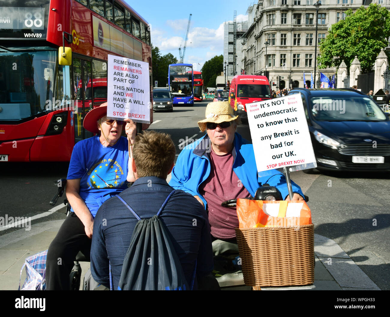 London, UK. 04th Sep, 2019. Demonstrators with anti-Brexit posters sit on a traffic island in front of the British Parliament. Credit: Waltraud Grubitzsch/dpa-Zentralbild/ZB/dpa/Alamy Live News Stock Photo