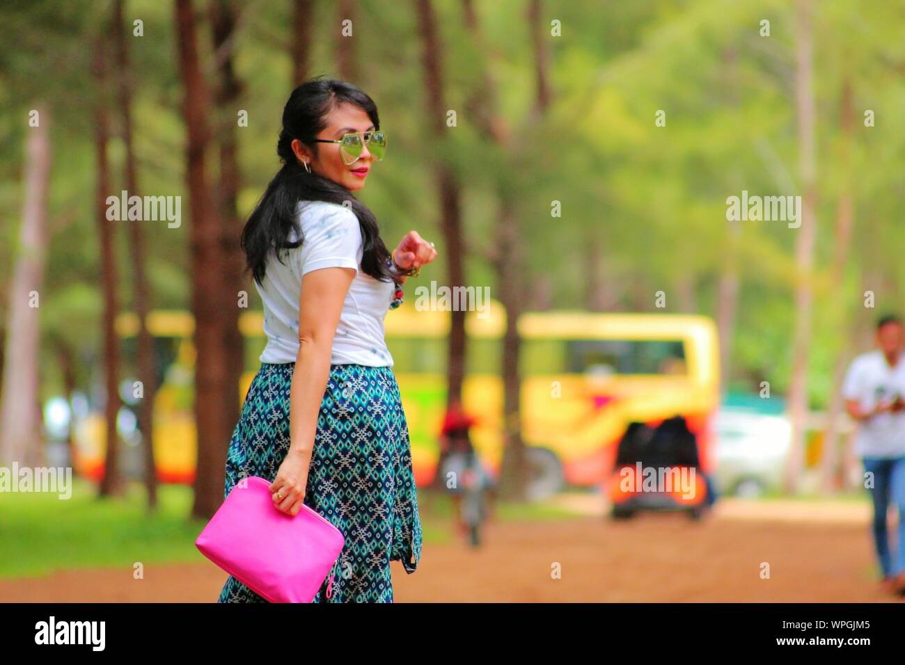 Beautiful woman walking road hi-res stock photography and images - Alamy