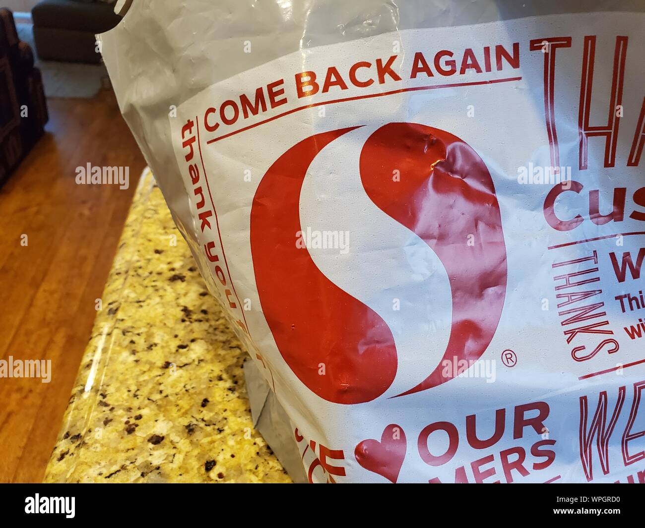 Closeup of logo for grocery store chain Safeway on reusable plastic