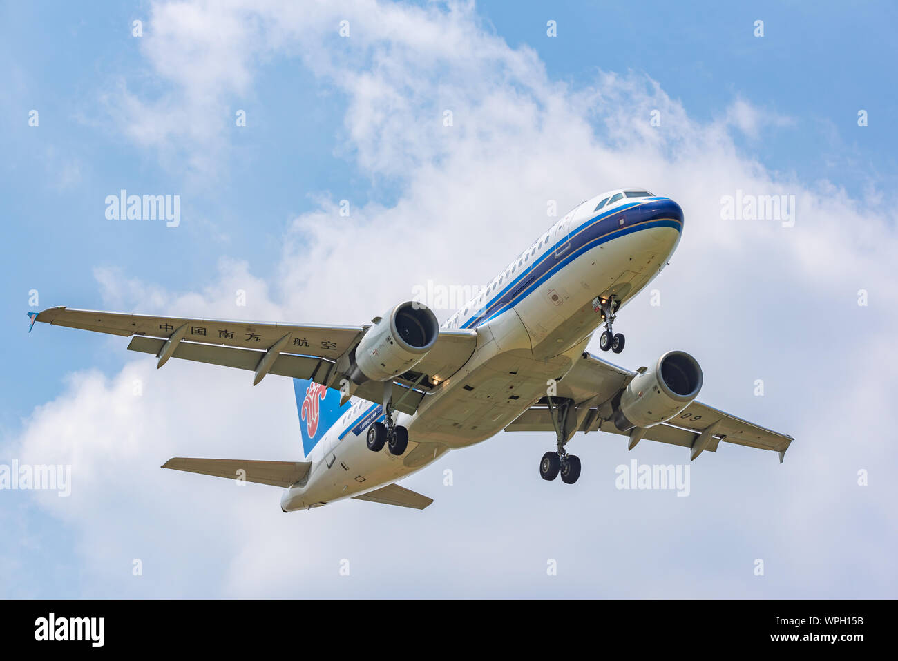 Chengdu airport, Sichuan province, China - August 28, 2019 : China Southern airlines Airbus A319 commercial airplane against sky Stock Photo