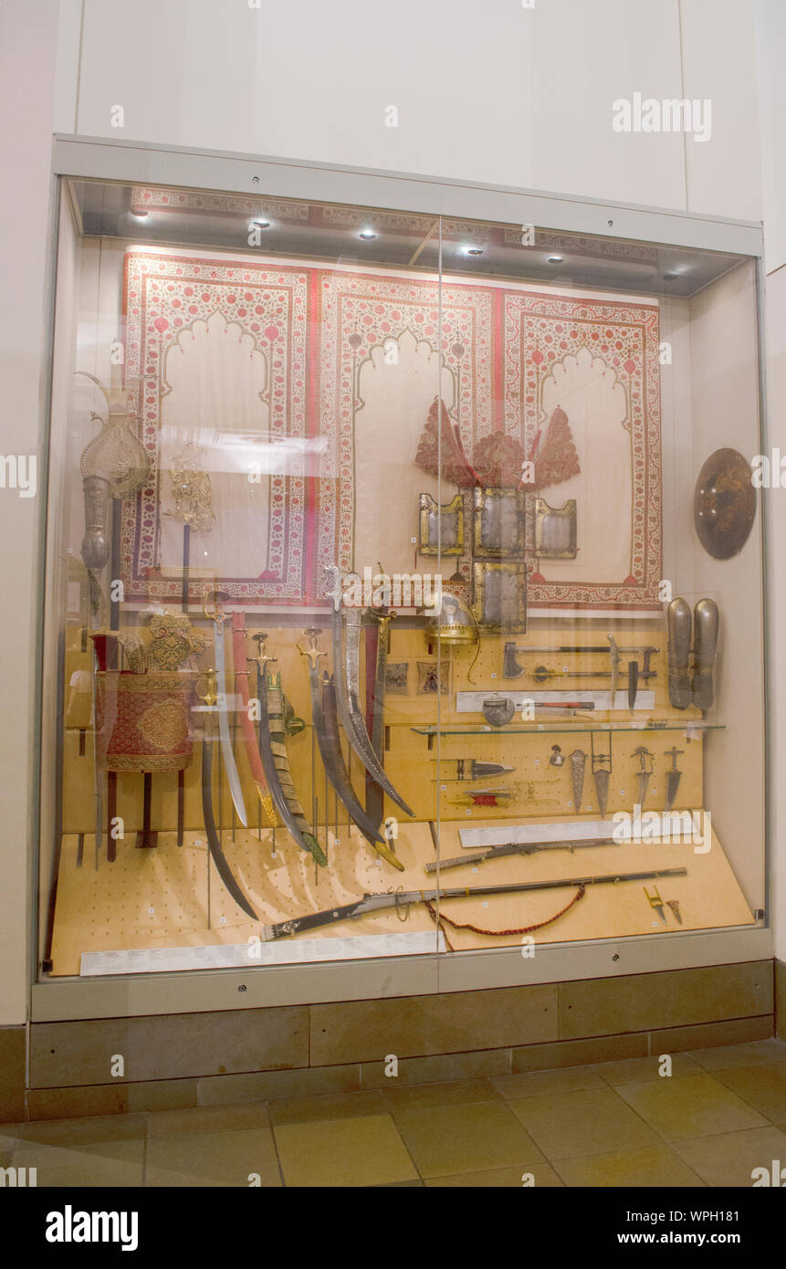 Swords | Shields | Scabbards | Guns | Daggers | Armours | Helmets | Knives | Axes | Mace and other Indian weapons. Victoria & Albert Museum. Stock Photo