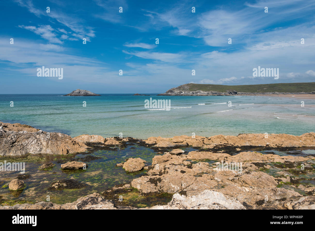 Walking the South West Coast Path around the West Pentire Peninsular at Crantock Bay, Cornwall Stock Photo