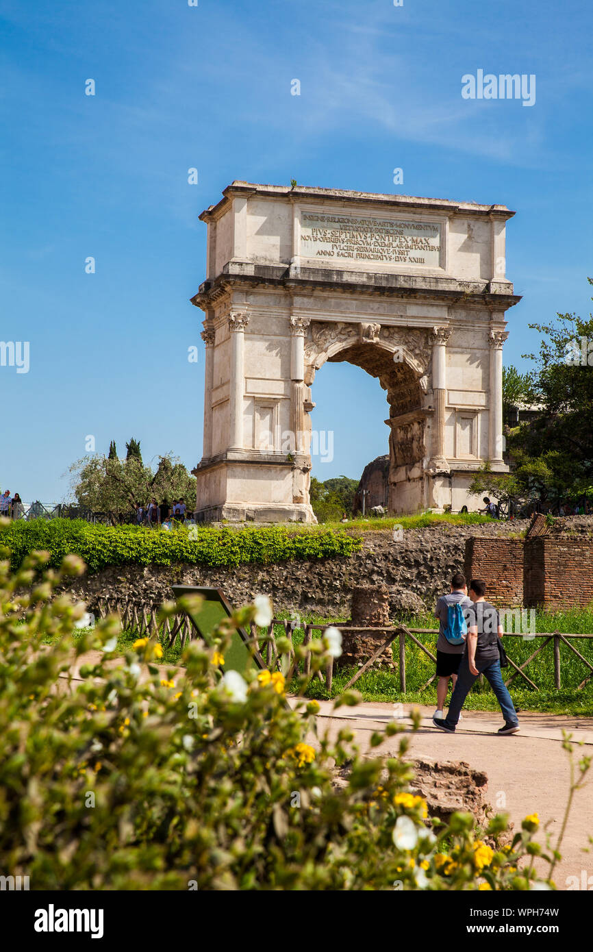 ROME, ITALY - APRIL, 2018: Tourists visiting the Arch of Titus on the ...