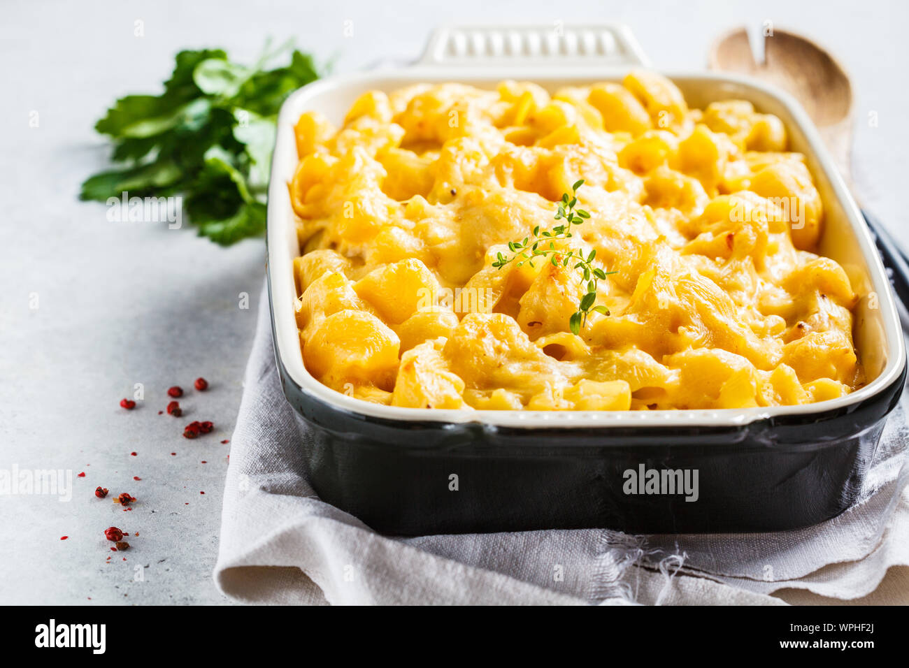 Mac and cheese in the oven dish, white background Stock Photo Alamy