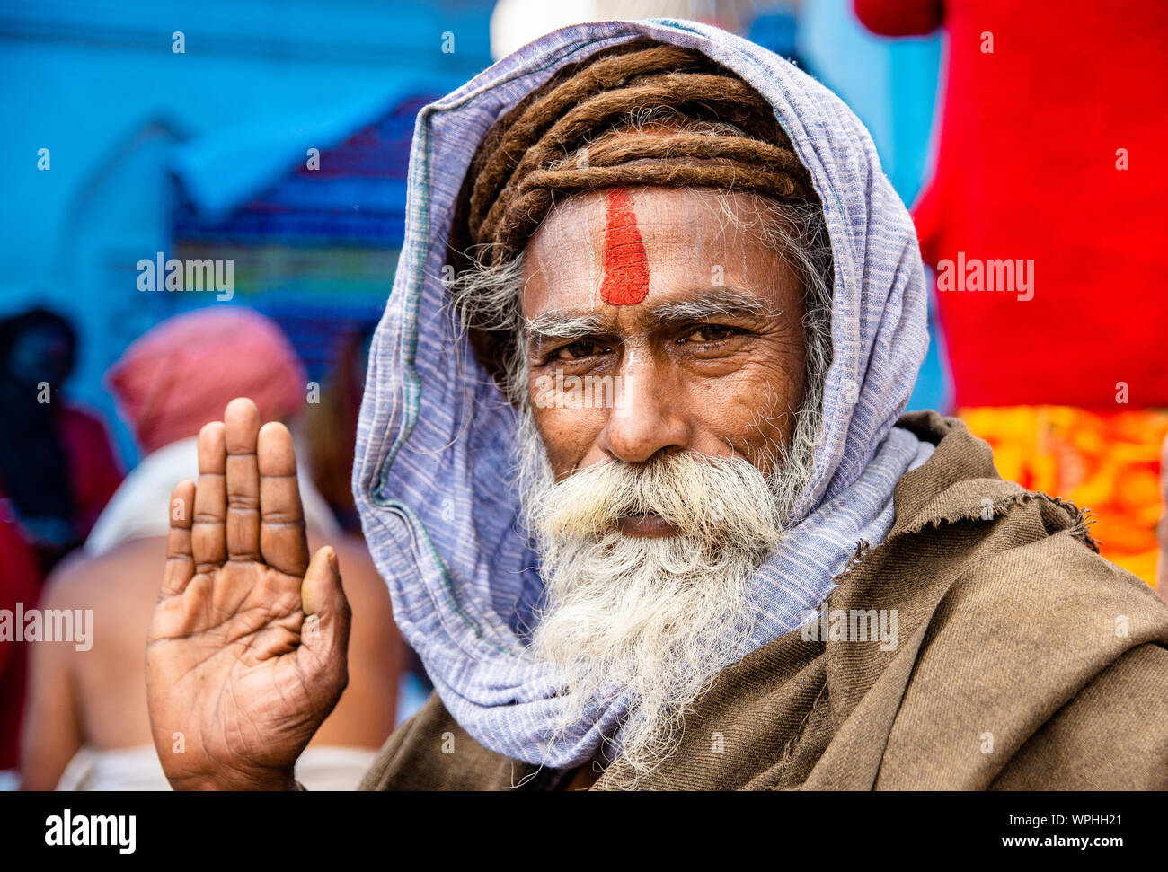 Hindu holy man poses for a photograph at the courtyard of the Pashupatinath Temple during Shivaratri. Stock Photo