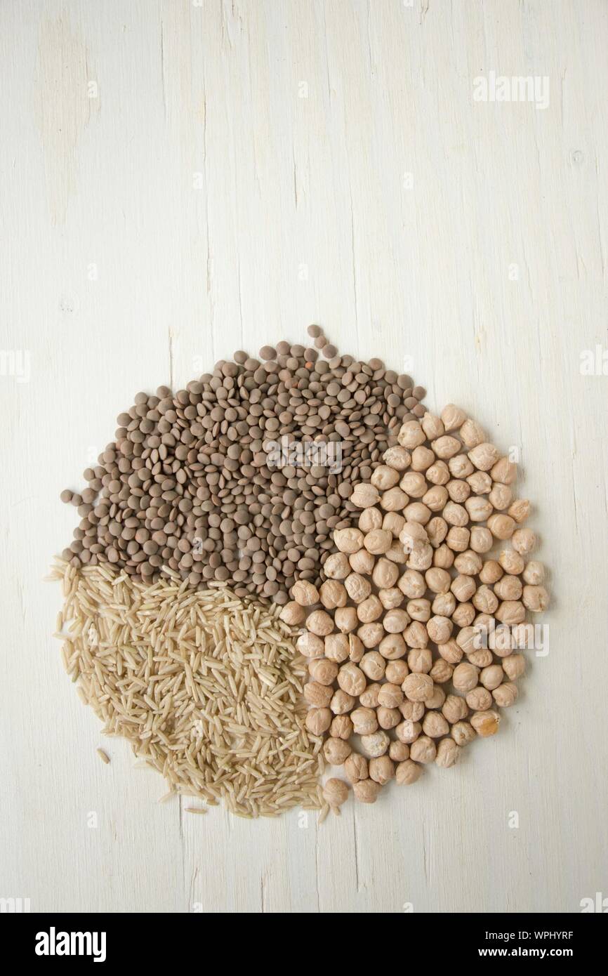 High Angle View Of Legume Arranged In Circle Shape On Table Stock Photo