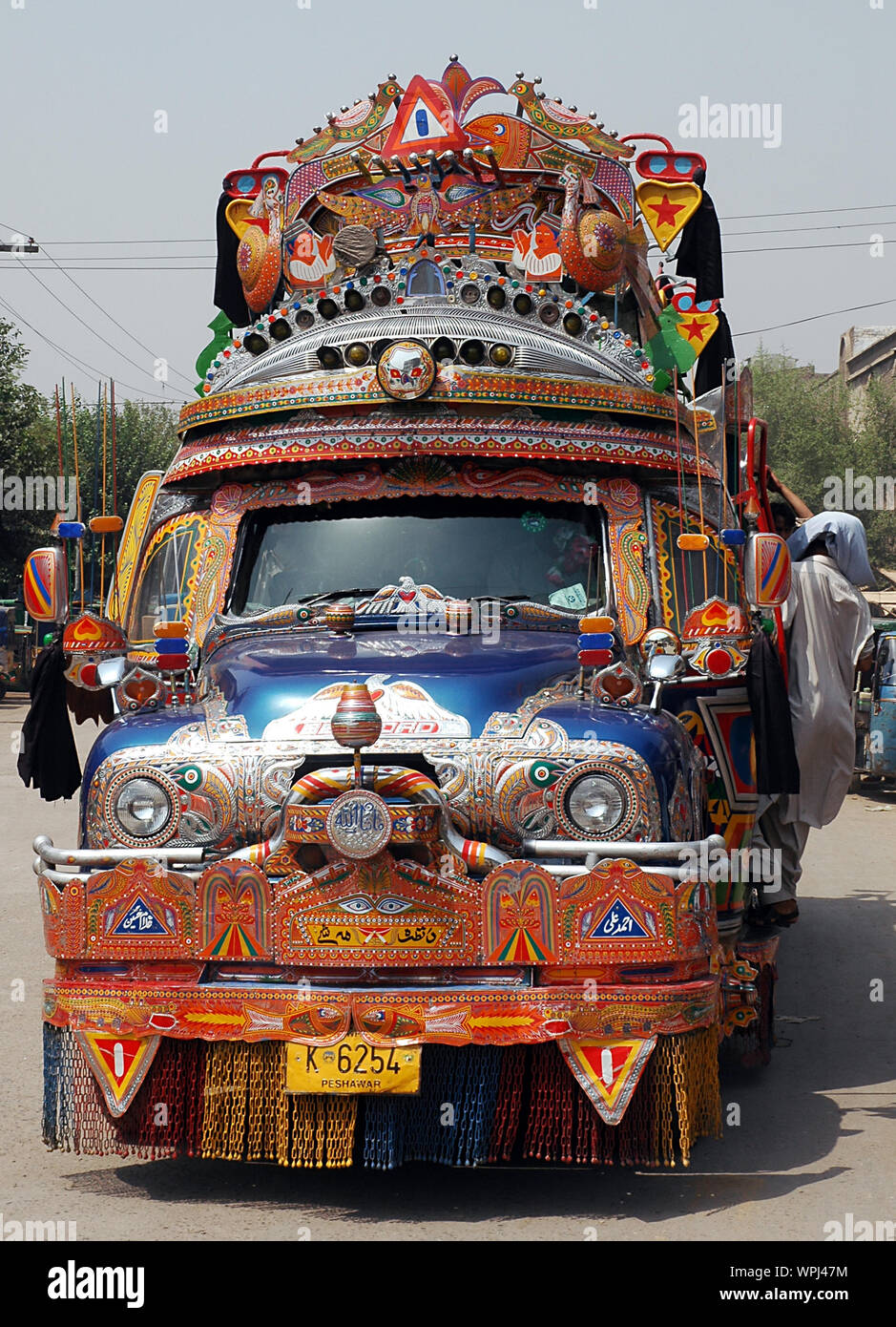 Colorful Bedford truck used as local transportation in Peshawar, Pakistan. The truck is colourful and used as a local bus in Peshawar, Pakistan. Stock Photo