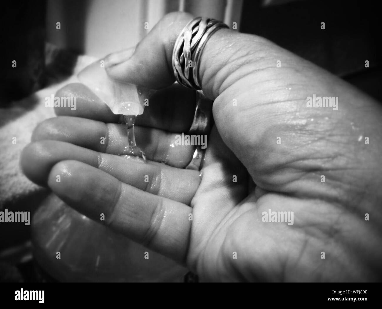 How to use hand sanitizer Black and White Stock Photos & Images - Alamy
