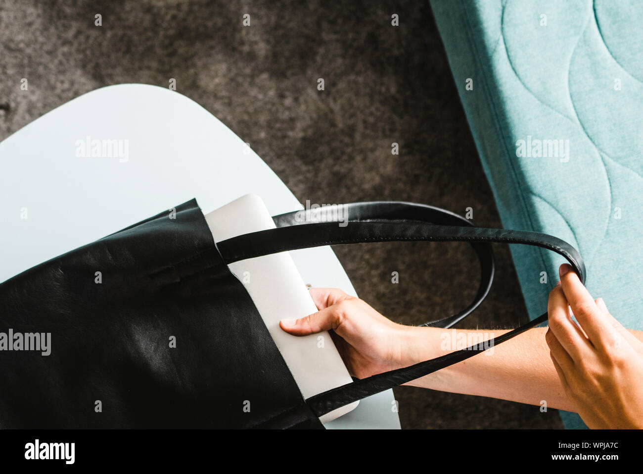 Black leather laptop bag hi-res stock photography and images - Alamy