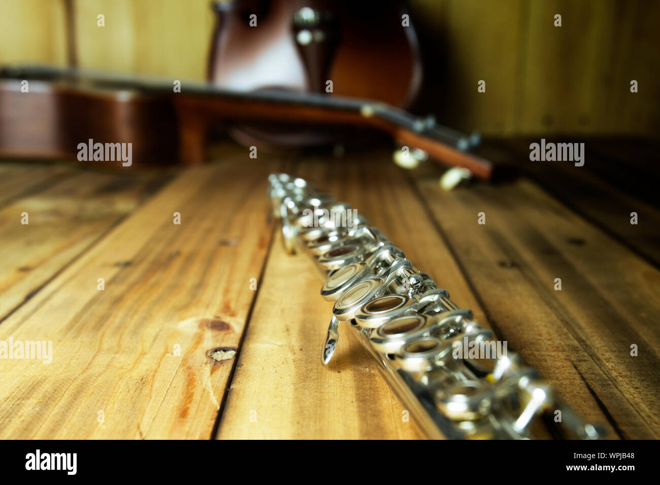 Flute,violin,ukulele music instrument on wooden Stock Photo Alamy