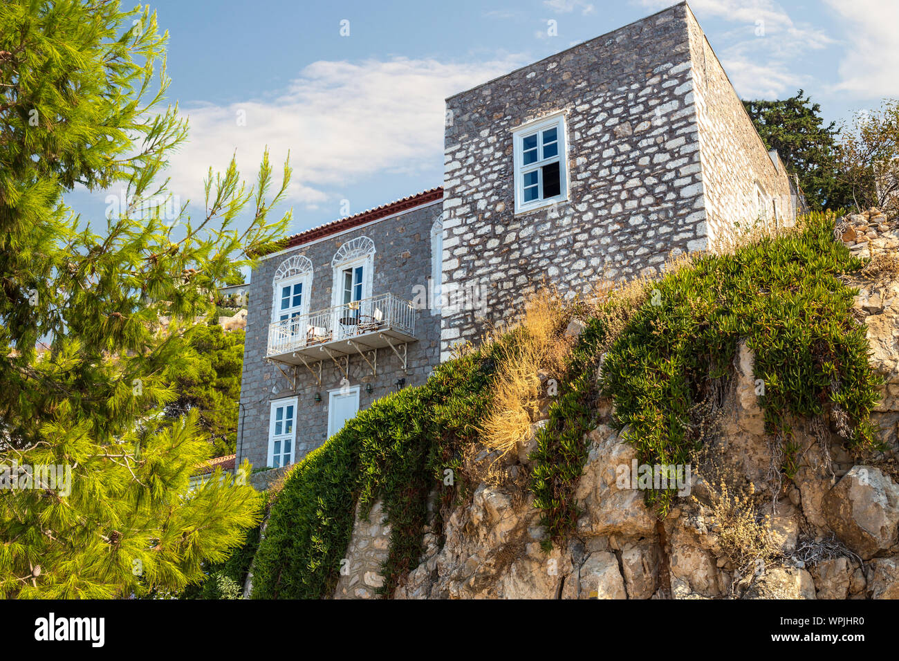 Narrow traditional white street in the town of Hydra, Hydra island