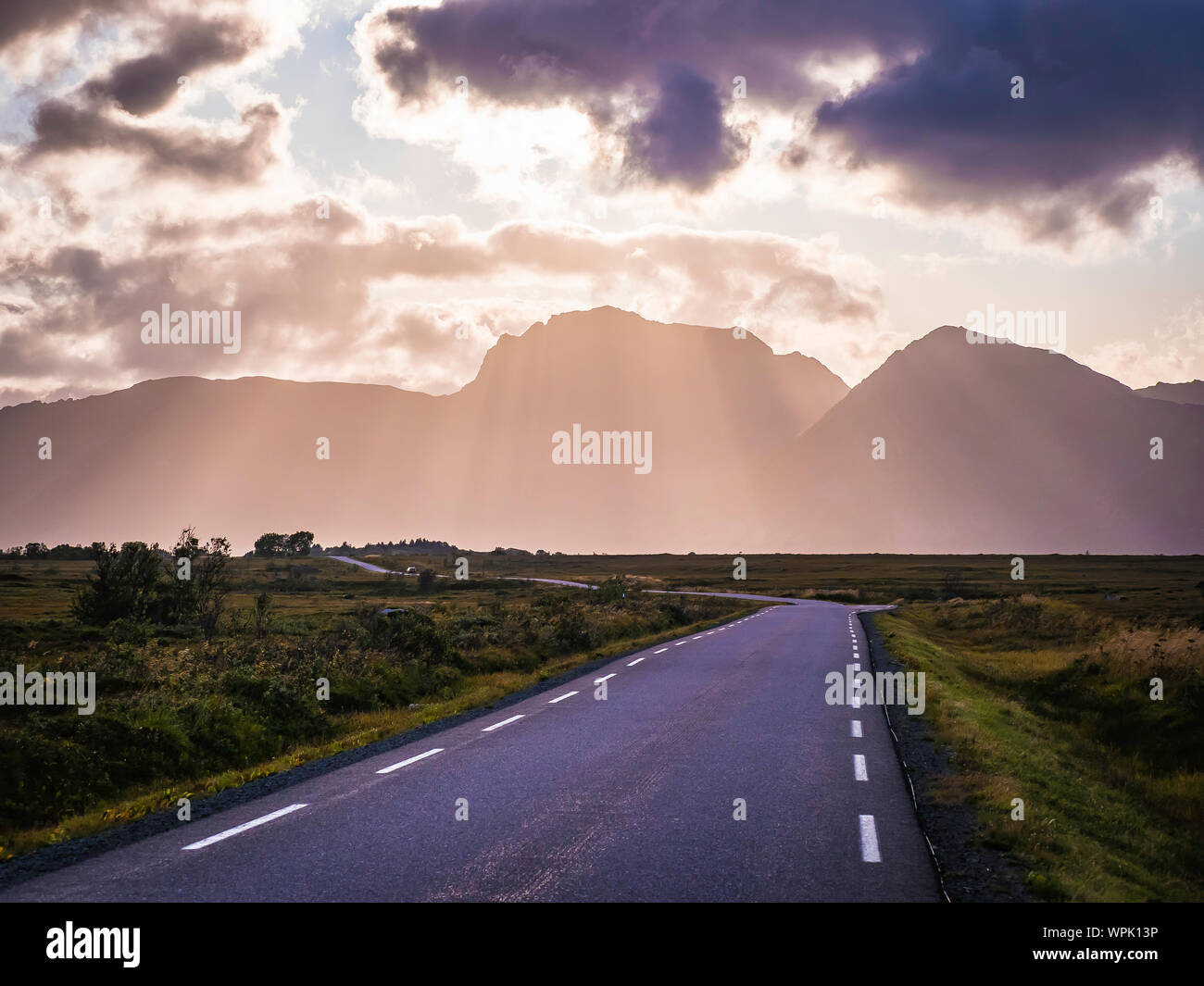 Dramatic landscape on E10 highway in Lofoten during sunset, North Norway Stock Photo