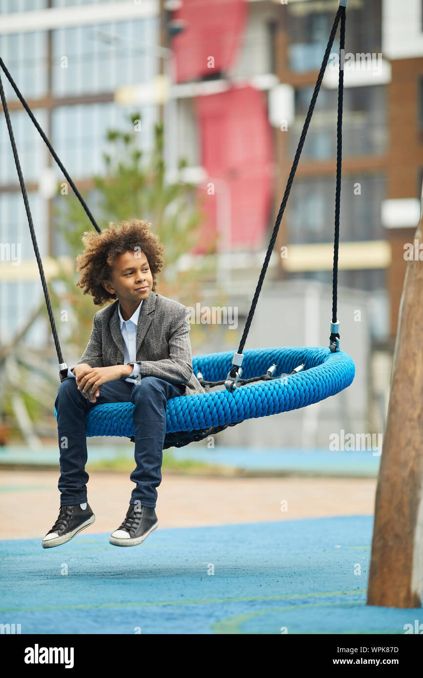 African boy sitting hi-res stock photography and images - Alamy