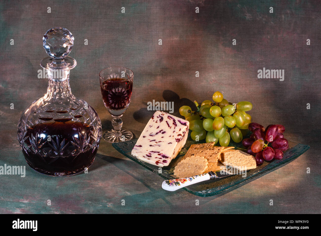 A glass of port, some cheese and biscuits Stock Photo