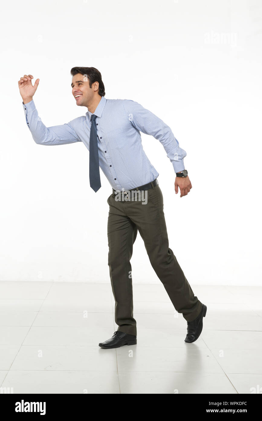 Businessman running Stock Photo